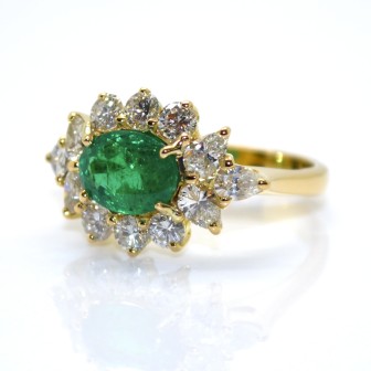 Engagement rings - Emerald and Diamond Cluster Ring